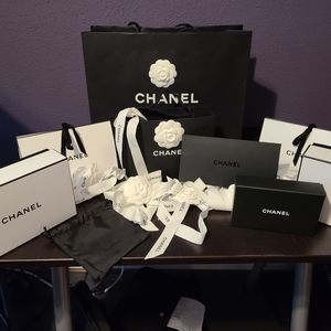 Chanel boxes, bags, bows, ribbon